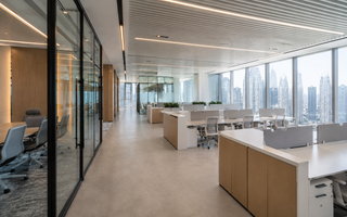 Modern office fit-out with partitions and ceiling grid completed