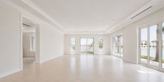 Vacant villa room with ceiling and trims repainted to a flawless mark-free finish for unit handover in Dubai