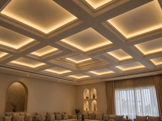 Coffered cove-lit gypsum ceiling in a villa Majlis — 4x3 grid with warm LED cove glow