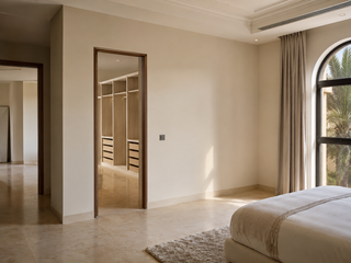 Villa room split — a new walk-in dressing room carved out of a master bedroom