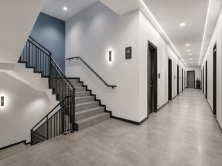 Repainted office stairwell and common areas in a commercial building