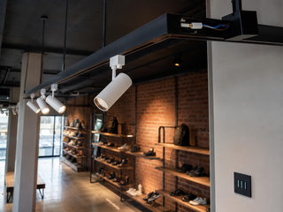 Track lighting fit-out in a retail showroom with dimming control